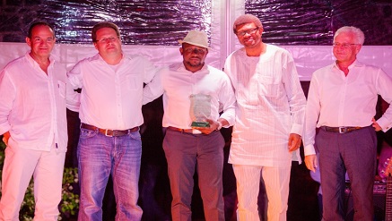 Olatayo Ladipo-Ajai, Head, e-Channels Business, CWG Plc receiving the Best Absolute Achievement award on behalf of Computer Warehouse Group Plc, from Peter Woydich, Sales Director, Wincor Nixdorf, at the recent Wincor Nixdorf’s Portugal, Middle East and Africa (PMEA) Regional Partners’ Conference and Award Ceremony held in Mauritius, with them are Paulo Gomes, President, Middle East and Africa, Wincor Nixdorf (left) and Eckard Heidloff, Chief Executive Officer, Wincor Nixdorf (right).